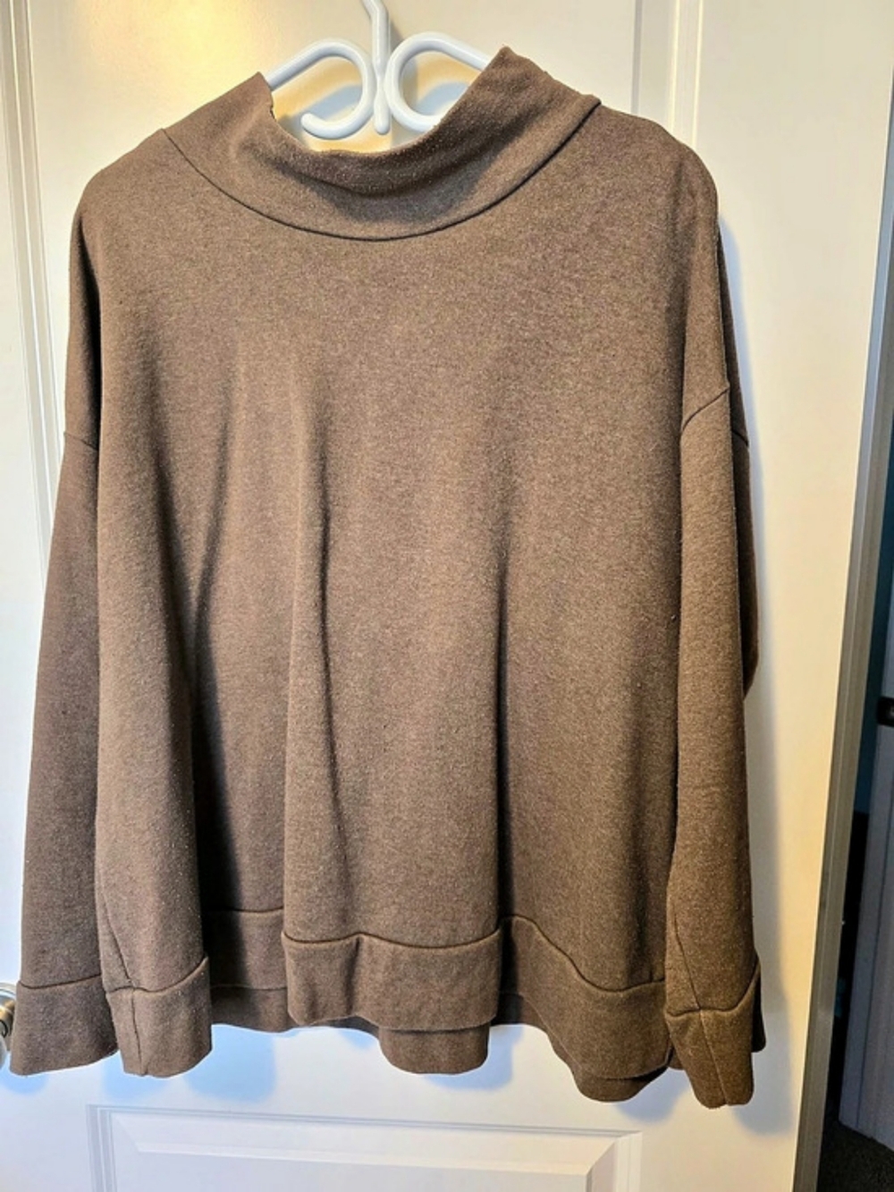 MohnTon Ruffle Hem Funnel Neck Top in Brown